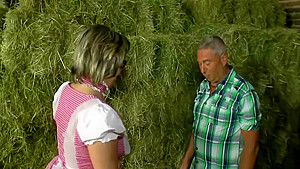 Older Couple Takes Break From Working At Field